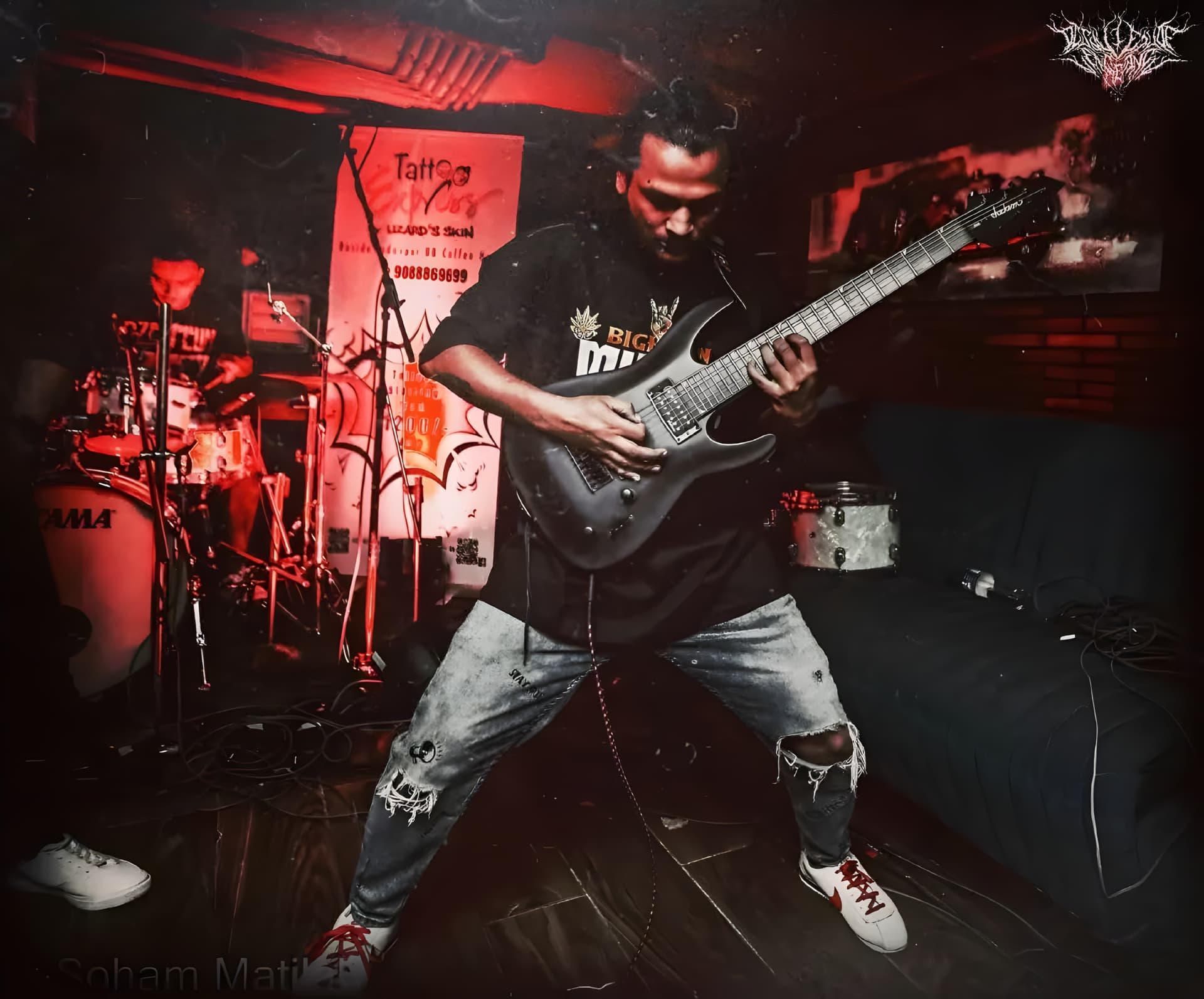 Subhajit Dutta performing guitar for Disquietude Vengeance.